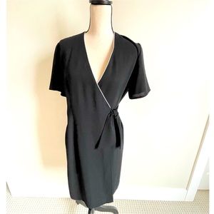 Vintage Woolworth’s wrap dress. Black with white outline. Very pretty. Size S.